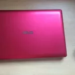 Компактный,  тонкий и легкий ноутбук ASUS X201E розового цвета. 