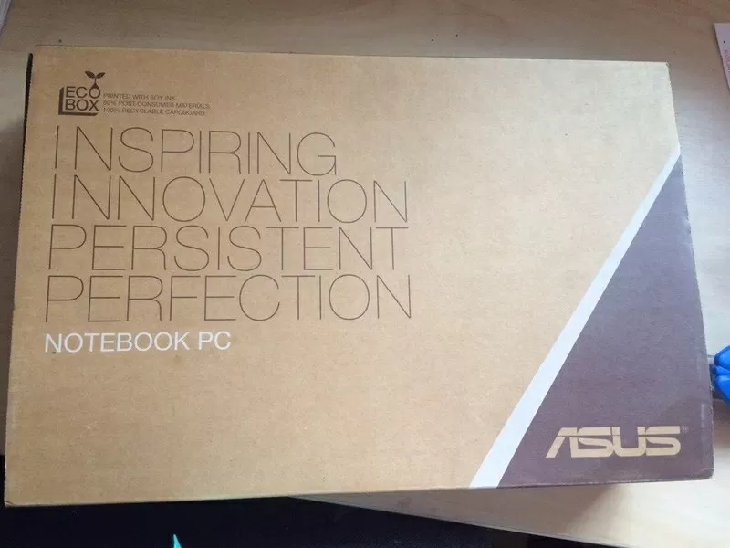 Компактный,  тонкий и легкий ноутбук ASUS X201E розового цвета.  2